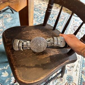 large round silver and leather extendable belt